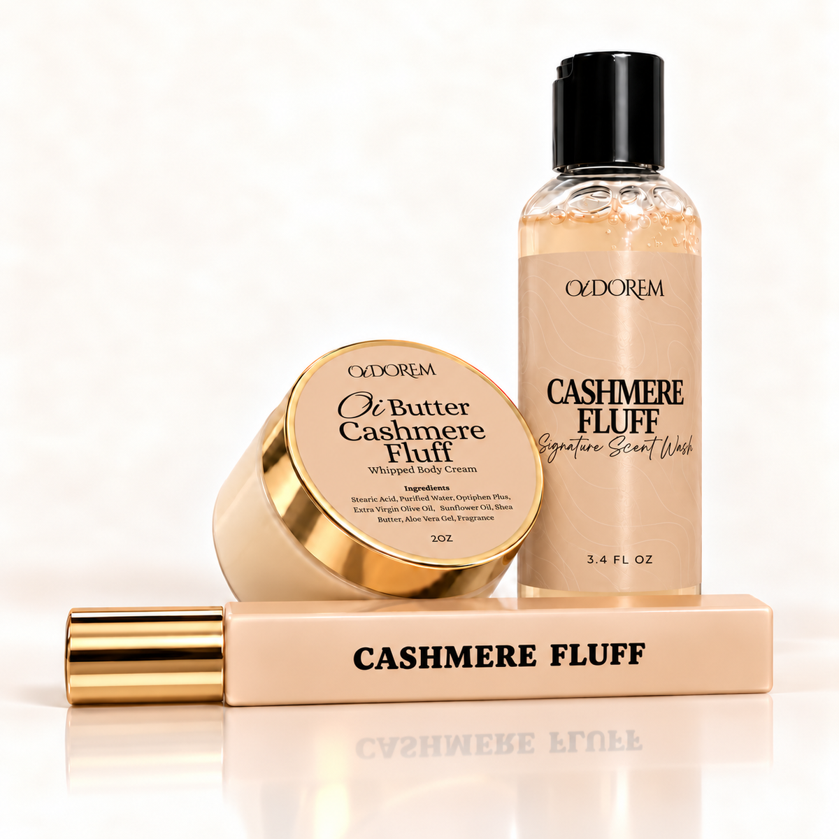 Cashmere Fluff travel bundle with 10 mL perfume, 3.4 oz body wash and 2 oz Oi Butter